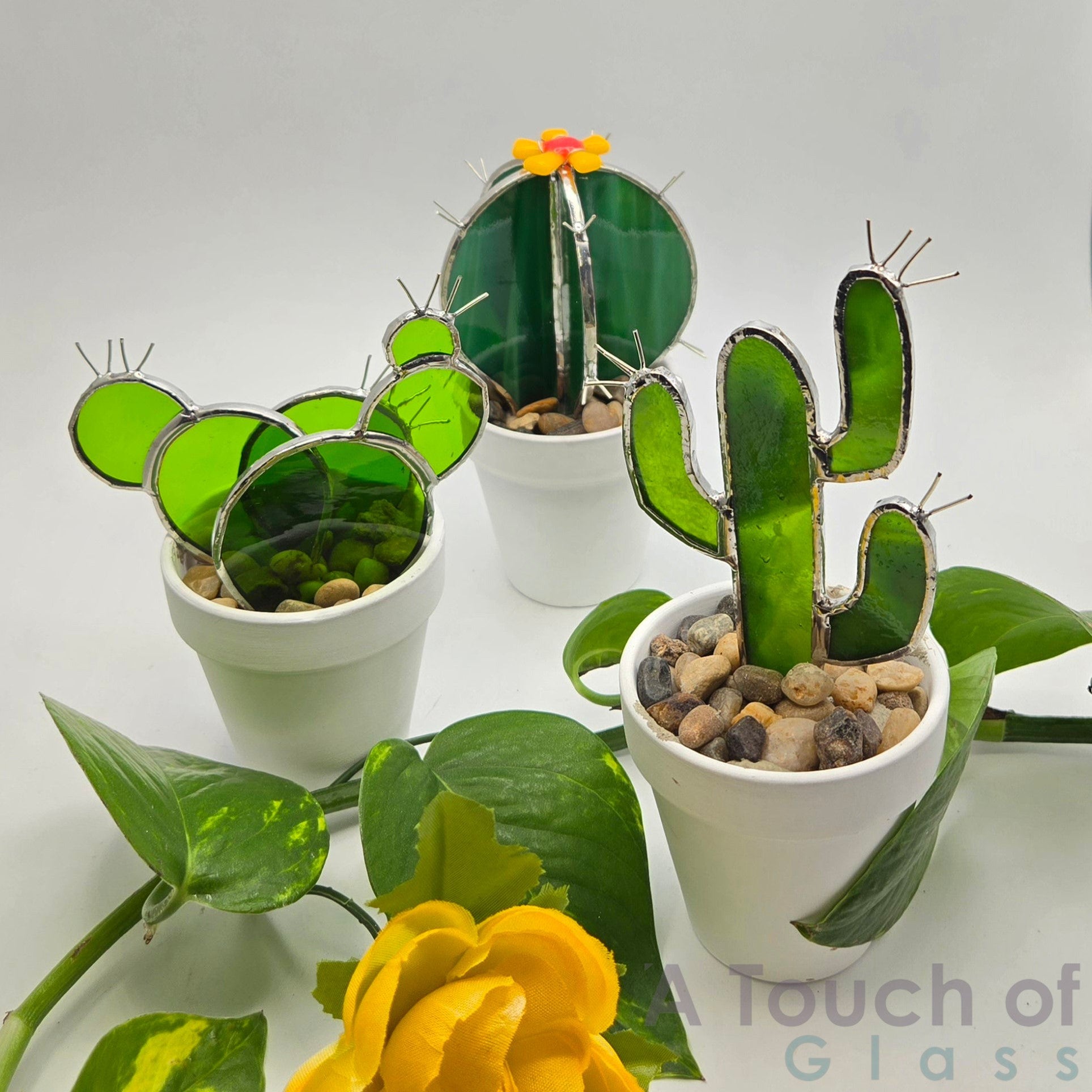Cactus with Flower (14 cm / 5.5 inches), Prickly Pear (12 cm / 4.75 inches), and Saguaro (15.5 cm / 6 inches).