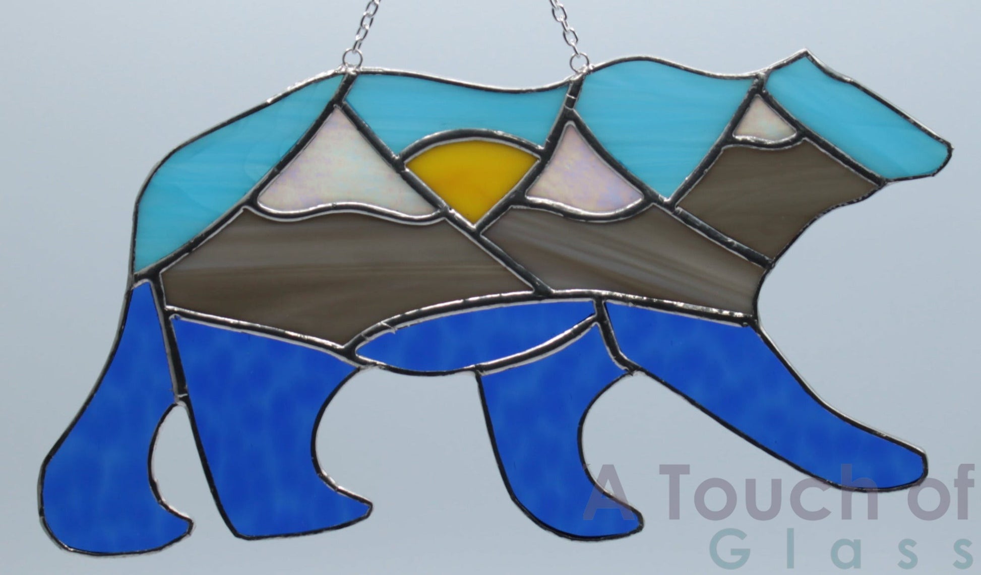Blue rustic stained glass bear suncatcher