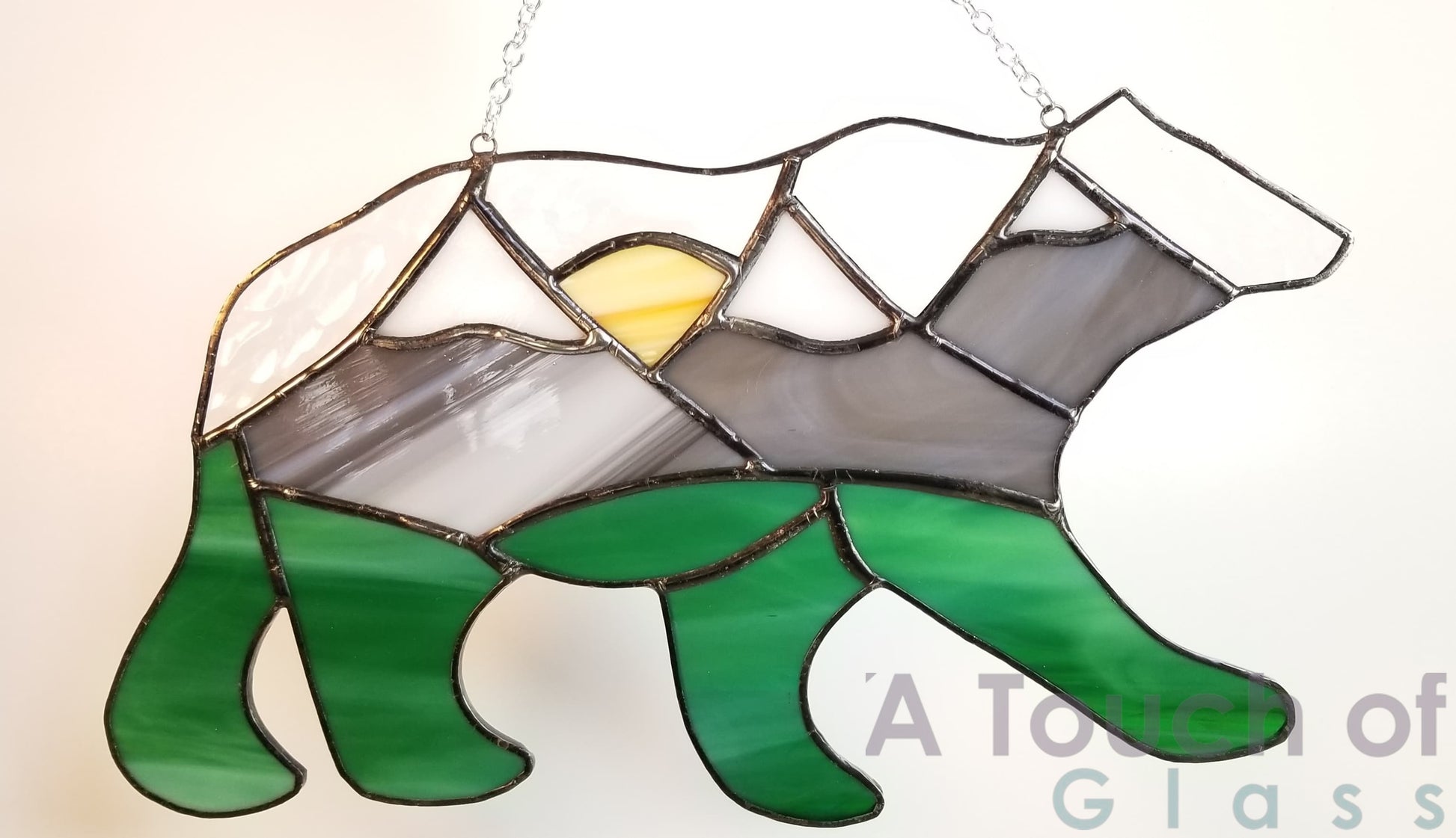 Green rustic stained glass bear suncatcher